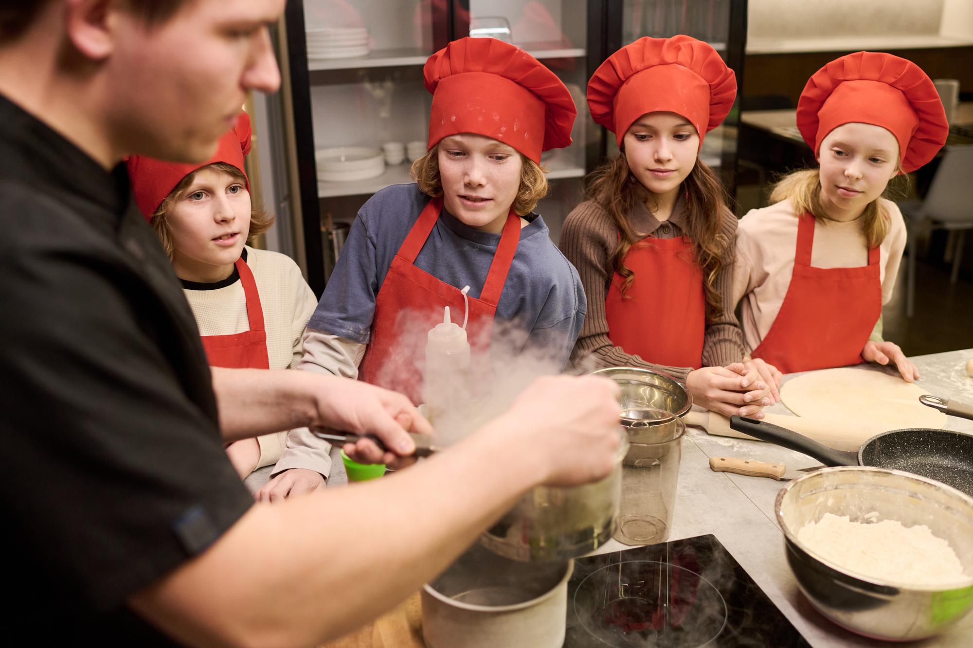 Students preparing ingredients at counter